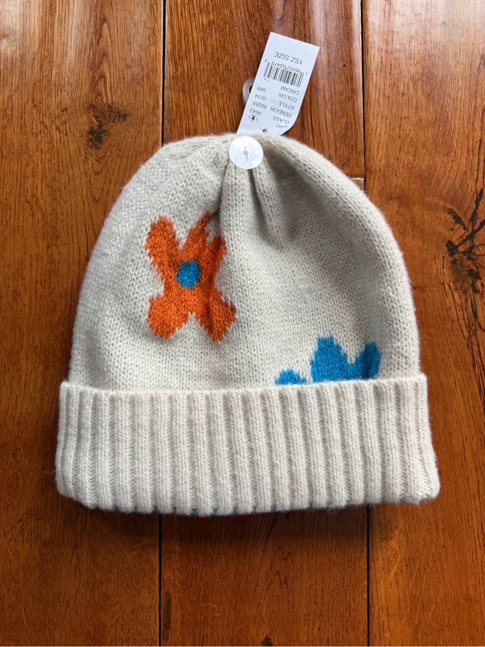 PacSun Cream Knit Beanie with Orange and Blue Floral Accents